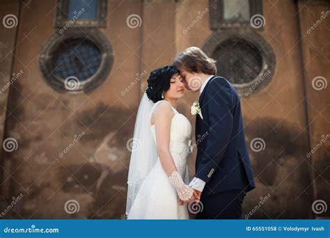 Sensual Husband And Wife Hugging In Ruined Porch Of Antique Palace