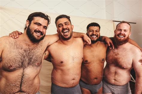 shirtless men with their arms around each other people images