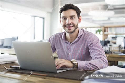 male office worker working  laptop  office technology project