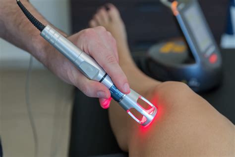 high power laser therapy pain relief olympic spine sports therapy