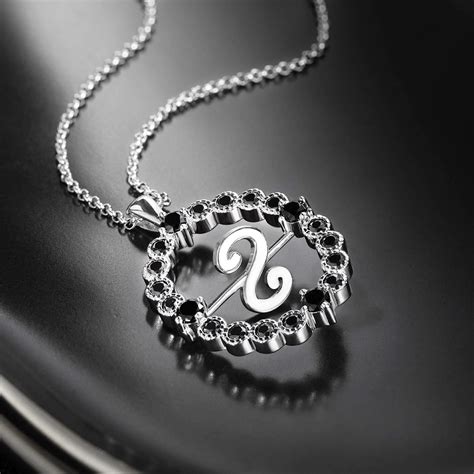 custom initial necklace rotating talisman morticia necklace sterling