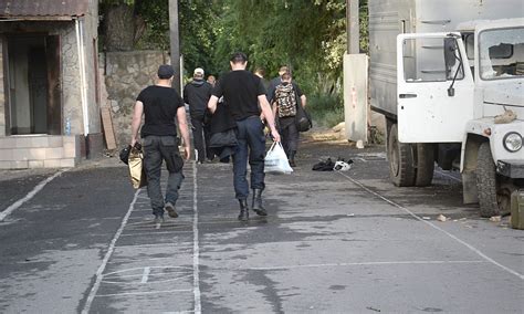 ukraine troops flee post in luhansk after running out of ammunition
