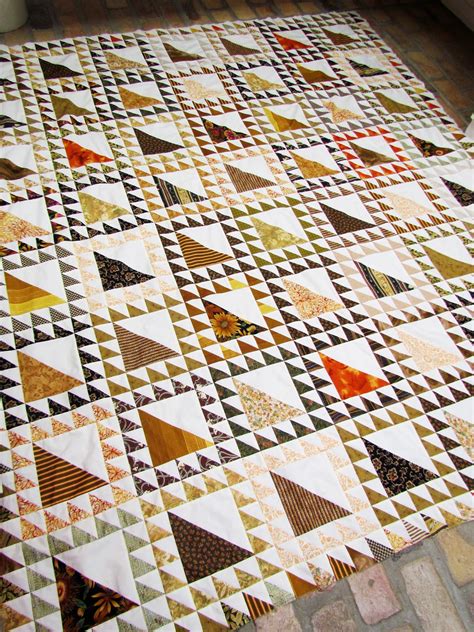 martys fiber musings  brown  square triangle quilt update