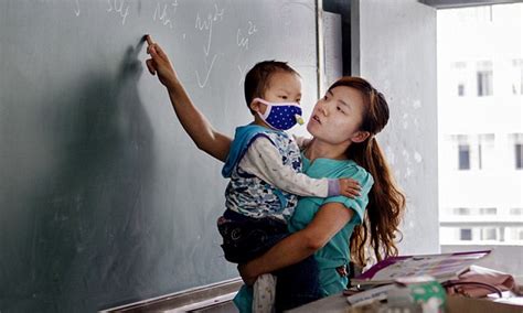 chinese mother takes son with advanced leukaemia with her to work at school daily mail online