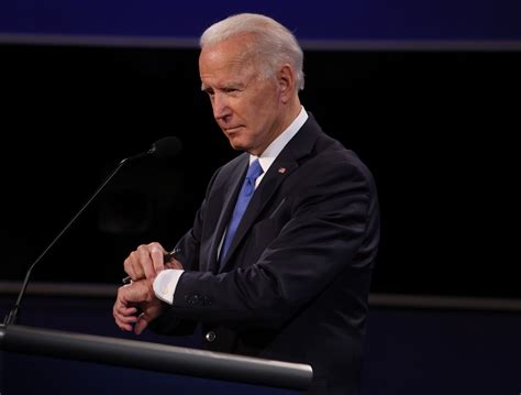joe biden looking at his watch during debate sparks jokes