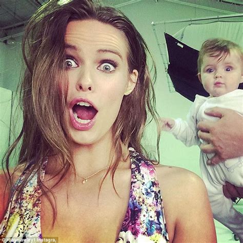 robyn lawley looks serene as she shares sweet snap holding her nine month old daughter ripley