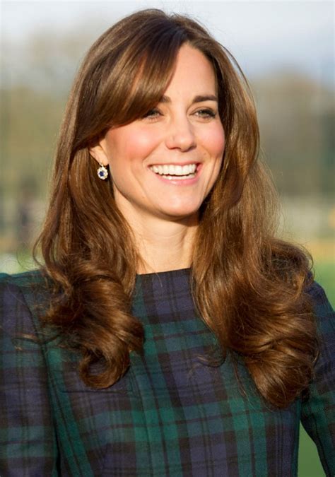kate middleton long brunette wavy curly hairstyle with bangs for spring styles weekly