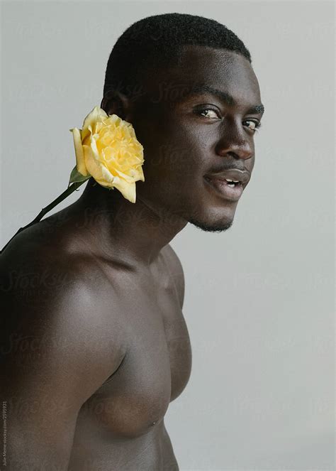 Portrait Of A Handsome Fit Black Guy Are Staring At You With The Yellow