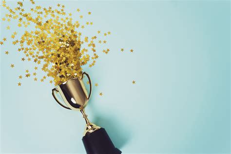 gold winner cup  blue background society   advancement  psychotherapy