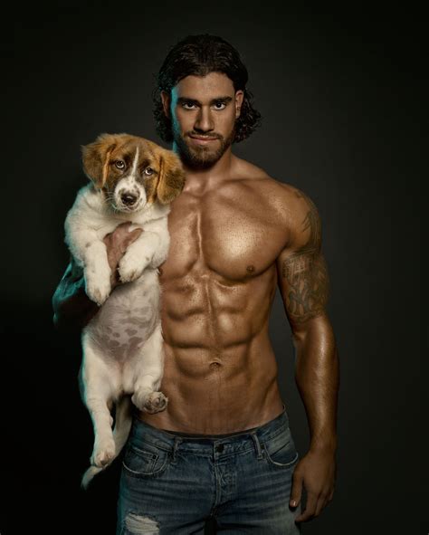 half naked men and cute puppies hunks and hounds calendar so wrong metro news