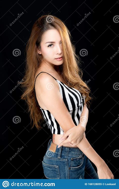 asian woman in jeans stock image image of happy background 168128055