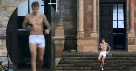 justin bieber strips down to boxers and runs about outside scottish mansion daily record