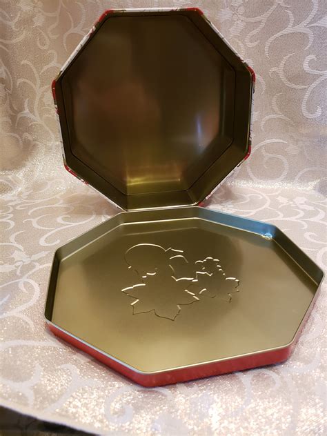 christmas tin box embossed hexagonal giftable tin