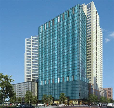 hilton opens dual branded hotel  downtown chicago hotel management