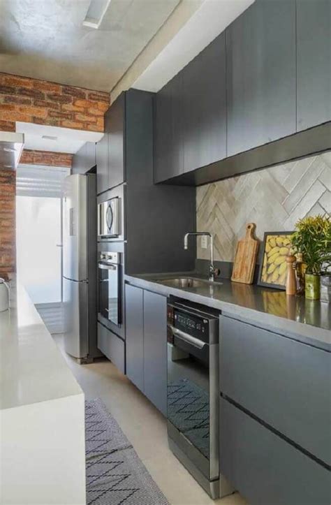 modern kitchen  stainless steel appliances  brick walls
