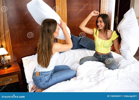 Pillow Fight Between Two Girls Stock Image Image Of Apartment