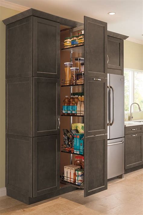 accessible   sides  tall pantry pullout cabinet  storing canned goods  kitch
