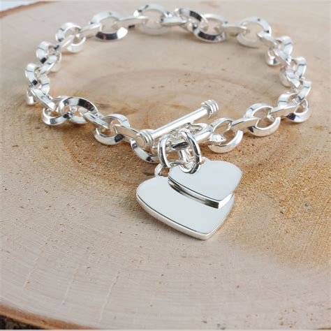 solid sterling silver t bar bracelet with two engravable hearts oval
