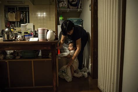 japan s working mothers record responsibilities little help from dads