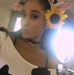 ariana grande oozes specs appeal as she poses for a