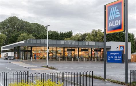 aldi  lidl reach record market share  shoppers continue     prices