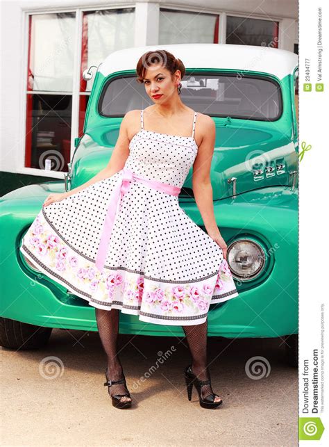 Pinup Girl In Front Of Retro Truck Royalty Free Stock