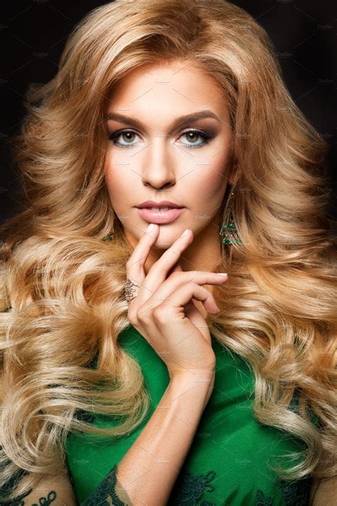 portrait  elegant sexy blonde woman  long curly hair  glamour makeup high quality