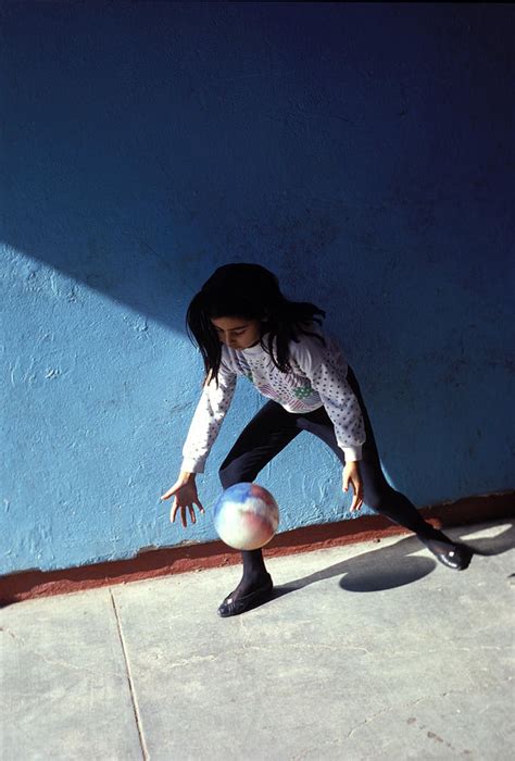 girl playing ball photograph by mark goebel fine art america