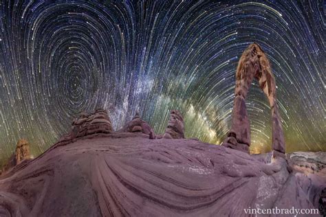 apod  march  warped sky star trails  arches national park