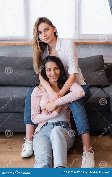 Happy Blonde And Brunette Lesbians Hugging Stock Image Image Of Home