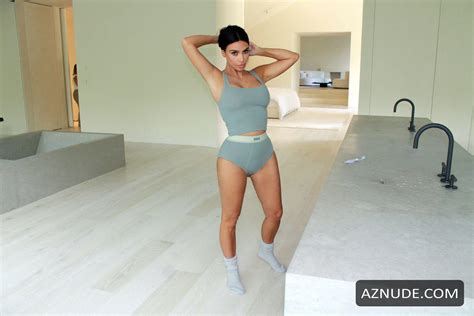 kim kardashian sexy in campaign images wearing bralettes tanks