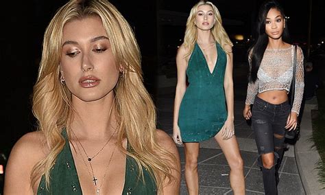 hailey baldwin flaunts cleavage in a plunging minidress at revolve event daily mail online
