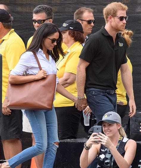 first photos of prince harry and meghan markle invictus