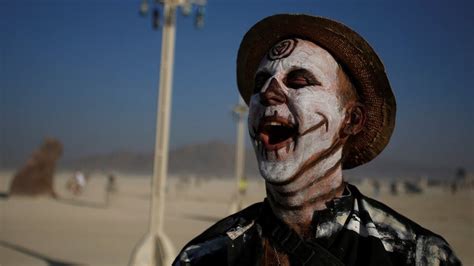 man dies from burns after running into fire at burning man festival in