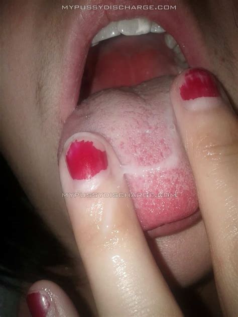 licking her cum from fingers