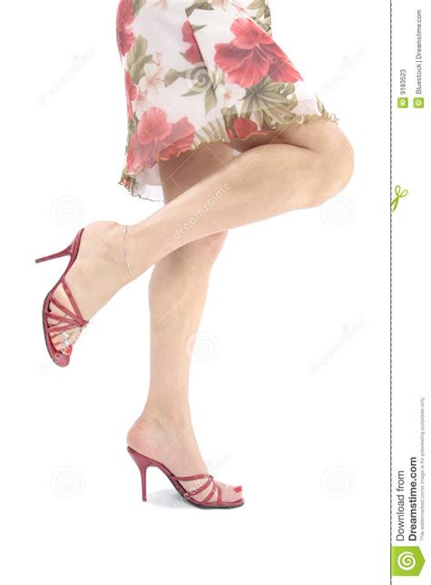 Beautiful Woman Legs And Feet Wearing Short Dress Stock