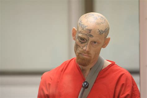 dude with a tattoo on his eyeball sentenced to 22 years for shooting a cop