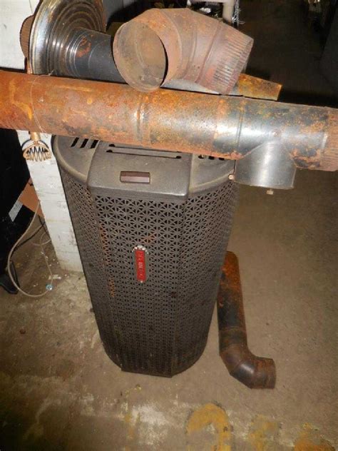 vintage coleman oil burning heater