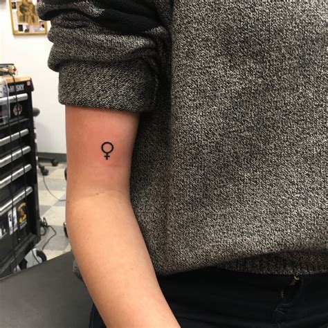 Little Tattoos — This Tattoo Symbolizes Feminism And Female