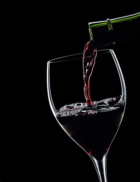 Red Wine Pouring Into Wineglass Splash Silhouette