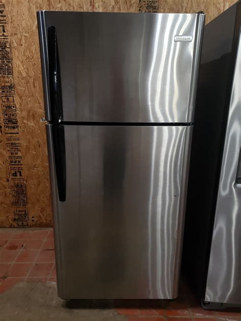 frigidaire stainless steel refrigerator  black handles