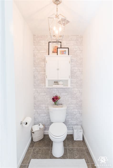 toilet room makeover reveal  clever bathroom storage kelley