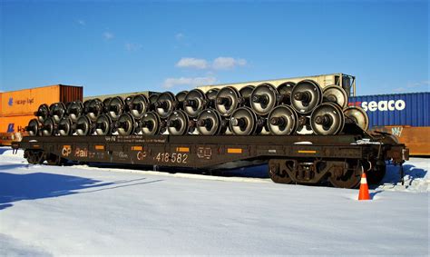 railpicturesca paul santos photo vintage cp flat car   load   rail car wheel sets