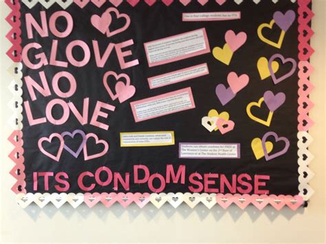 A Bulletin Board With Hearts And Words Written In Pink Black And