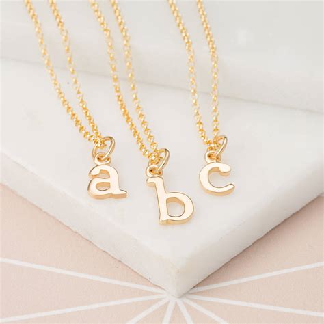gold initial letter charm necklace  lily charmed notonthehighstreetcom