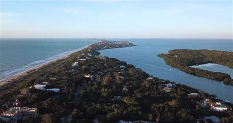 aerial drone shot  north  captiva island florida view includes villas stock footage
