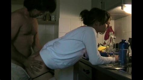 Couple Having Sex In Kitchen