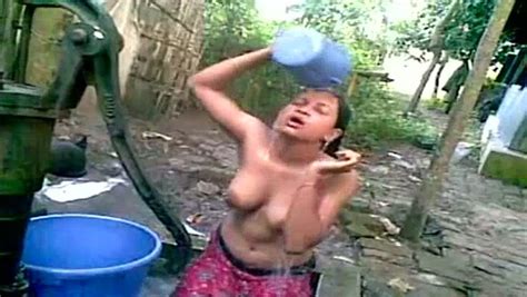 busty amateur indian lady naked washing herself outside