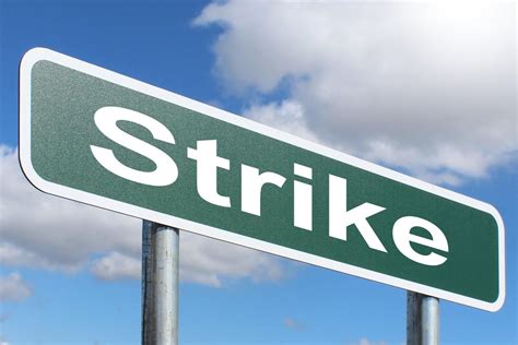 strike   charge creative commons green highway sign image