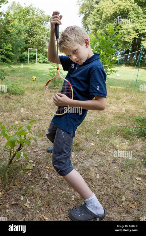 polish boy age  playing air guitar   badminton racquet zawady